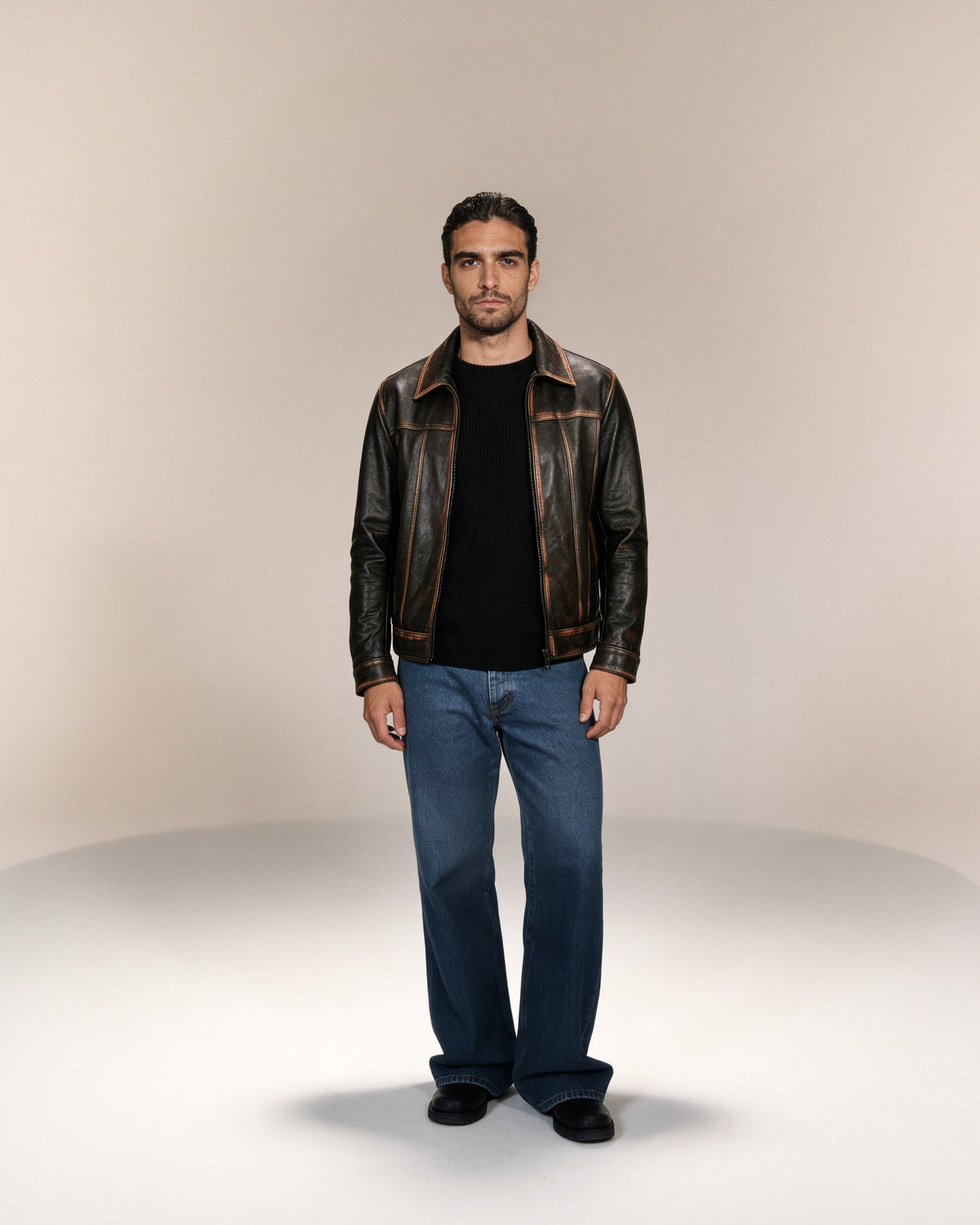 Anticato Trucker — worn by a model, front view, studio